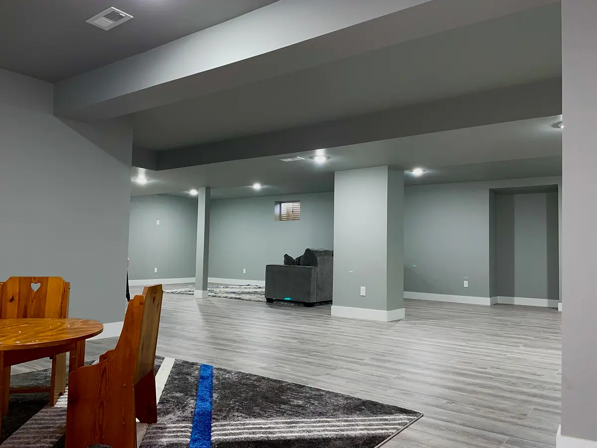 Colorado Remodeled Basement, finished, gray walls, gray wooden floor and spot lights